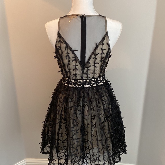 Black and sheer cocktail dress with tiny ribbons - Picture 4 of 4